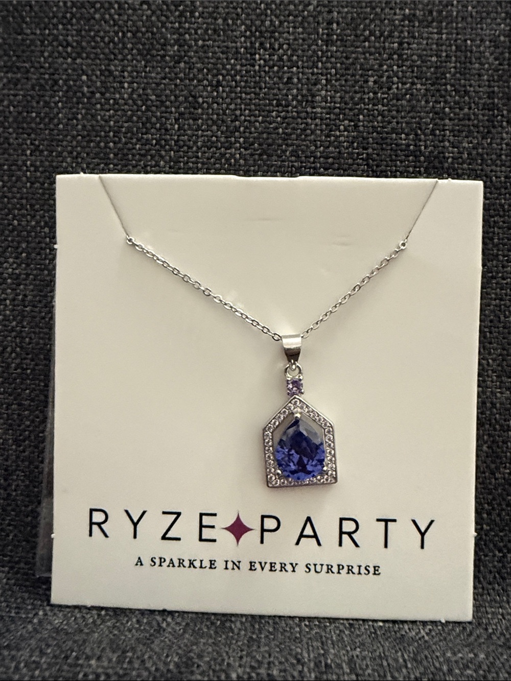 Ryze Party .925 sterling Silver Necklace with Blue Teardrop Pendant